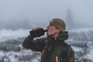 How do you carry water while hiking